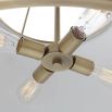 White ceiling light with brass frame details