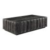 Bold black wooden coffee table with bevelled panel sides