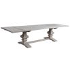 A grand farmhouse style extendable dining table with a gorgeous grey/off-white finish 