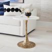 Glamorous side table with round white marble top on a textured brass base