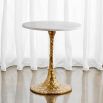 Glamorous side table with round white marble top on a textured brass base