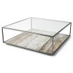 Sleek coffee table with eye-catching marble base and grey minimal frame with glass top