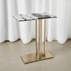 Brass base side table with black and white marble top