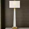 A luxury side lamp by Uttermost with a sophisticated white marble and brushed brass finish
