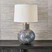 Blown glass bodied lamp with white and god matte finish