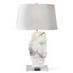 Organic cut of translucent alabaster adorns the lamp base with a tapered oval shade