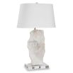 Organic cut of translucent alabaster adorns the lamp base with a tapered oval shade