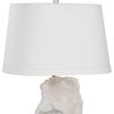 Organic cut of translucent alabaster adorns the lamp base with a tapered oval shade