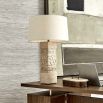 Hieroglyphics-inspired brown lamp with off-white linen shade