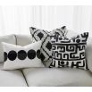 Textured diamond pattern cushion in black and white