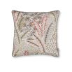 A lovely embroidered satin cushion by Romo featuring gorgeous pops of colour against warm neutrals