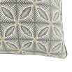 Natural cushion with green geometric pattern and cream reverse