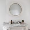 Charming round mirror with thick white frame