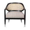 Enchanting armchair with black frame, rattan backrest and sumptuous linen seat