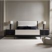 Discover the sleek Rhythm Bedside Table in black from Caracole. Perfectly blend style and functionality for your bedroom decor.