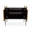 A luxurious Parisian style contemporary cabinet with bras accents and acrylic finials 