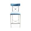 A stylish, light blue counter stool with a dazzling, silver frame 