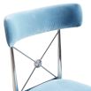 A stylish, light blue counter stool with a dazzling, silver frame 