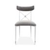 A chic grey velvet dining chair with a white metal frame 