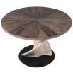 Circular dining table with twisted plinth base