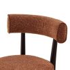 A striking dining chair with a sophisticated design and recycled upholstery