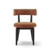 A striking dining chair with a sophisticated design and recycled upholstery