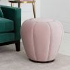 An elegant bespoke pouffe with a petal effect