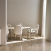 Discover the elegant Romus Extending Dining Table by Caracole. Perfect for any occasion, its light finish adds sophistication to your dining space.