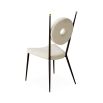 A fabulous cream boucle and blackened steel dining chair 