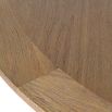 Circular wooden dining table