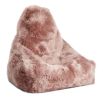 A sumptuously soft and snuggly bean bag chair made from New Zealand Sheepskin