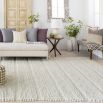 Ivory handwoven rug with loops, knots and basket weave patterns