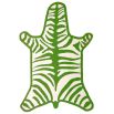 A playful and colourful flatweave rug with a vibrant zebra print