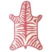 A playful and colourful flatweave rug with a vibrant zebra print