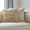 Elevate your décor with the Sand Dunes Woven Cushion in Beige. Soft, stylish, and perfect for adding a touch of warmth to any space.