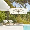 A gorgeous sun lounger from Skyline Design with a lovely natural frame and beautiful sunbrella upholstery 