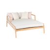 A luxury outdoor double day bed with a stylish sunbrella upholstery and natural base