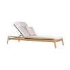 A gorgeous sun lounger from Skyline Design with a lovely natural frame and beautiful sunbrella upholstery 