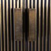 Large brass cabinet with black legs