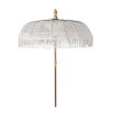 Beautiful macrame parasol with ornate wooden handle. 