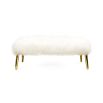 A lavish, white Mongolian bench with polished brass legs