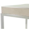 A stylish side table with a shagreen leather top and cube-shaped, polished nickel base