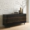 A sensational statement sideboard by Caracole featuring a slice of oak 
