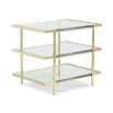 A glamorous gold end table by Caracole with a mid-century modern appeal