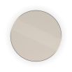 A chic coffee table by Caracole with a glamorous gold finish 