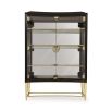 A luxury display cabinet from Caracole with glamorous gold details