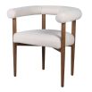 Cosy Scandinavian style dining chair with a rounded wrap-around boucle backrest and sumptuous boucle seat