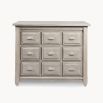 A sophisticated chest of drawers crafted from recycled white pine wood