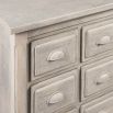 A sophisticated chest of drawers crafted from recycled white pine wood