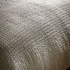 Beige quilted bedspread with black stitching